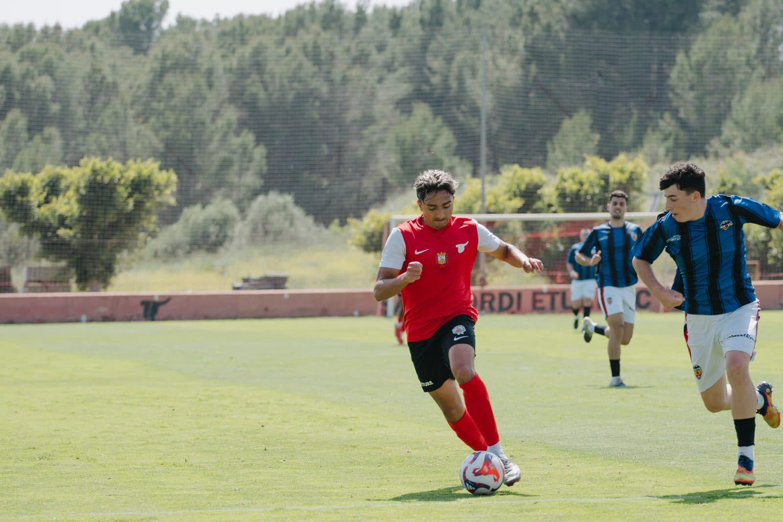 Zain Thompson on the ball for Eture FC