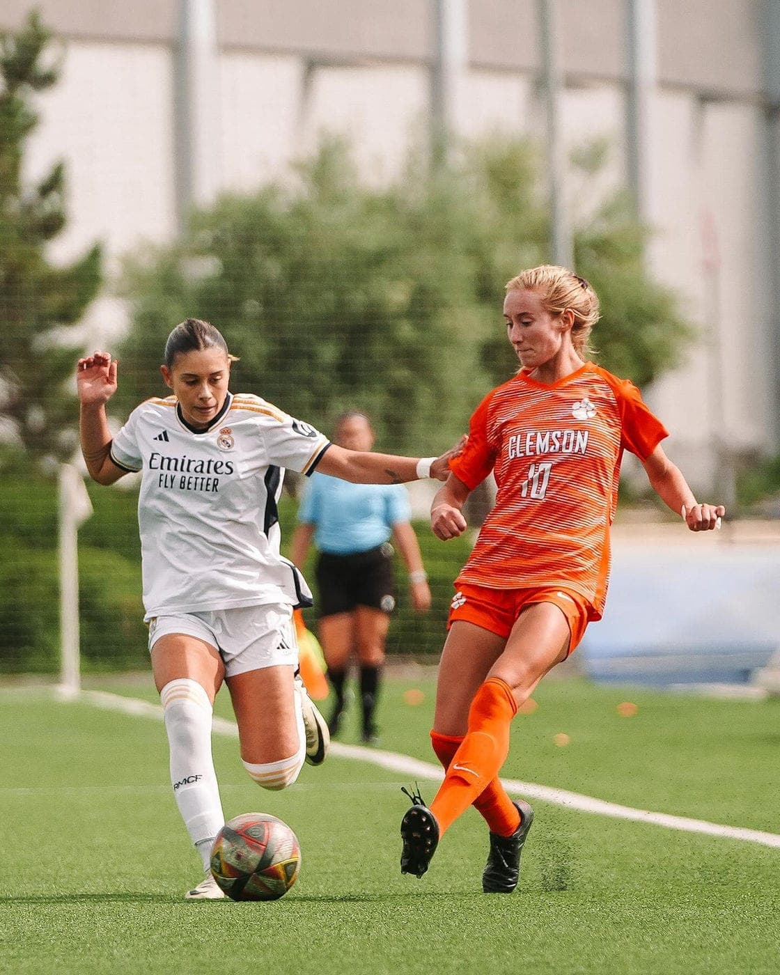 A player striking the ball in a women's fixture in Spain