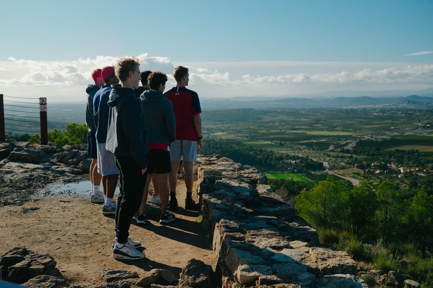 The squad on a hike above the valley