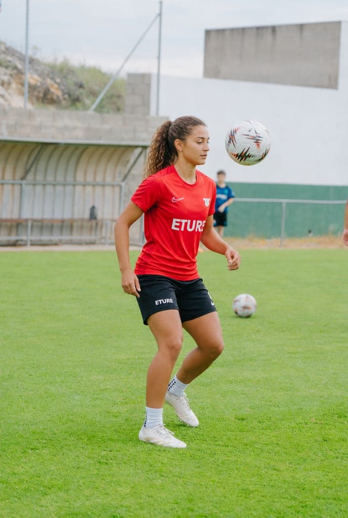 A player striking the ball in training