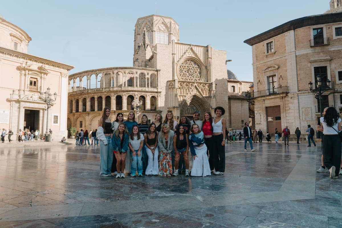 The group in a cathedral square in Valencia's old town